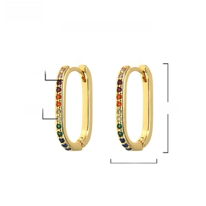 Detailed close-up of 18K gold-plated oval hoop earrings with AAA+ rainbow zircon inlay