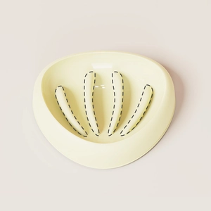 Cream yellow slow feeder bowl for cats and dogs with anti-choke rounded ridge design