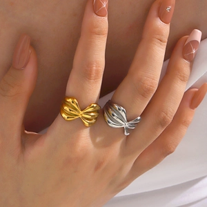 Fashion 18K gold and silver plated stainless steel bow rings with textured finish for women
