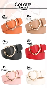 Detail view of heart-shaped metal belt buckles with pearl accents in multiple colors
