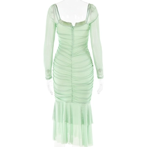 Detail view of light green mesh dress back with elegant ruffles and fishtail hem