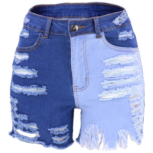 Detail of high-waisted denim shorts featuring two-tone blue contrast and distressed edges