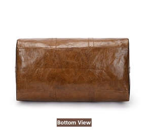 Detalle de la base rectangular con costuras limpias en el bolso de viaje de cuero PU marrón