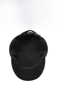 Detail of winter men's flat top cap featuring warm fleece lining and foldable ear flaps