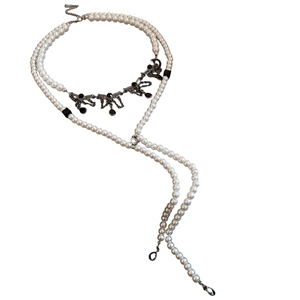 Double-layer pearl necklace with black wing charms and water drop pendants in vintage style