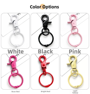 Detail of colorful matte metal lobster clasps and keyrings in six assorted vibrant colors