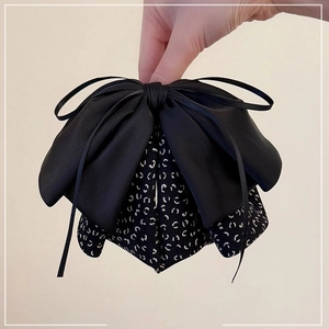 Elegant large black silk bow hair claw clip with polka dot fabric layers for women