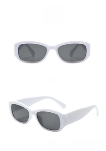 Front and side view of retro white frame sunglasses with gray lenses for a stylish look
