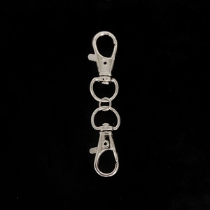 Macro view of silver double-ended swivel lobster clasps for DIY jewelry making