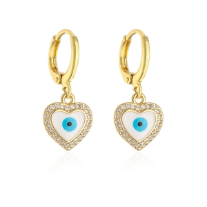 Macro shot of gold-plated evil eye heart earrings with zircon studs on white background