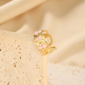 Close-up detail of the irregular surface on this gold-plated stainless steel ring