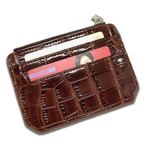 Brown crocodile pattern PU leather card holder with zipper coin pocket on white background
