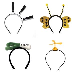 Detail view of four funny cartoon headbands including onion and propeller styles