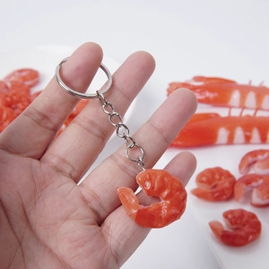 Realistic PVC shrimp tail keychain pendant with vivid orange texture and metal ring