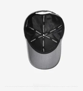 Detailed interior of a grey baseball cap with narason branded seam tape and lining