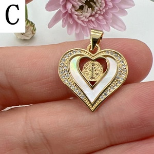 Golden heart pendant with white mother of pearl and Guadalupe motif in the center