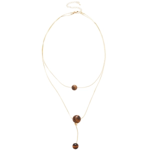 Double-layer gold necklace with tiger eye stone beads on a clean white background