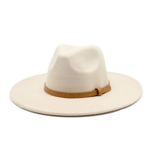 Close-up of beige fedora hat with textured brown faux leather strap decoration