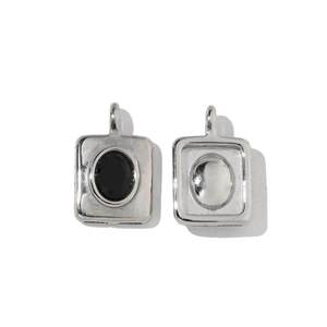 Detailed front and back view of a silver heart-shaped pendant with black turquoise stone