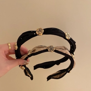 Black and beige camellia flower headbands with gold roses and rhinestones