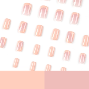 Pink French style press-on nails with minimalist wavy lines and square oval shape