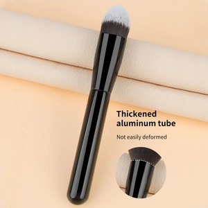 Detail of foundation brush with dual-tone synthetic bristles and thickened aluminum tube