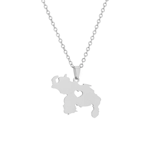 Macro shot of silver stainless steel Venezuela map pendant necklace with heart cutout