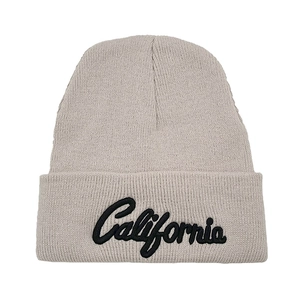 Close-up of California cursive embroidery on beige ribbed knit beanie for men and women