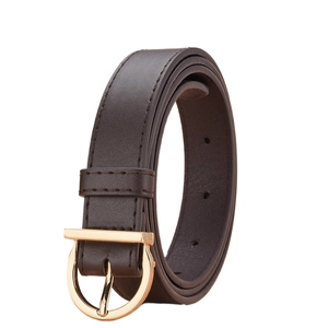 Close-up of brown leather belt with gold horseshoe buckle and fine stitching details