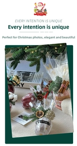 Macro view of Christmas gift wrap featuring natural pine cones, cinnamon, and cotton décor