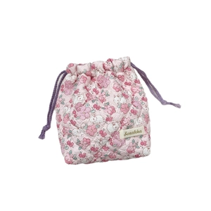 Quilted floral drawstring storage bag with Sorakka label for travel toiletries