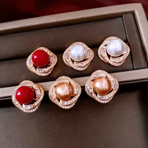 French vintage pearl and zircon stud earrings in red, white, and champagne gold colors