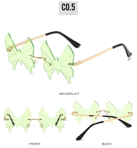 Detail view showing front, back and side profile of rimless green butterfly sunglasses
