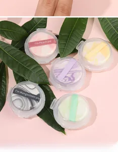 Detailed set of five colorful marble-patterned finger puffs in a clear round storage case