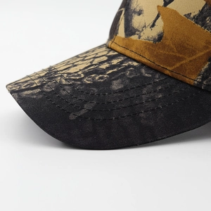 Close-up of the five-line parallel stitching on the camouflage baseball cap brim