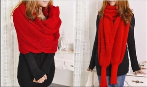 Detail view of red knitted scarf wrap showing two stylish wearing styles on a model