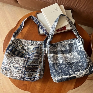 Bohemian paisley linen shoulder bag with wide strap and minimalist vintage floral patterns
