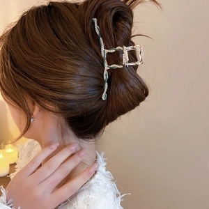 Elegant metal shark hair claw with dark green enamel and pearls for women hair styling