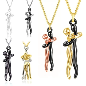Artistic minimalist hug pendant necklaces shown in six metallic color combinations