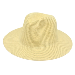 Detailed view of weave texture on the beige Panama straw hat with a classic fedora crown
