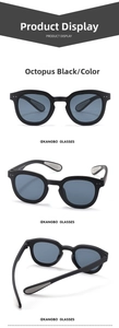 Detail view of retro round kids sunglasses in octopus black showing frame texture and rivets