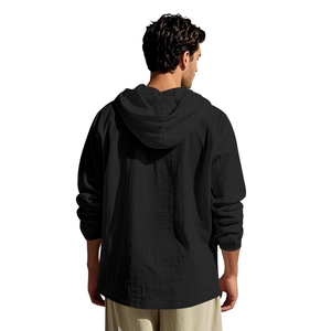 Back view of a black linen hoodie for men showing hood detail and natural fabric texture
