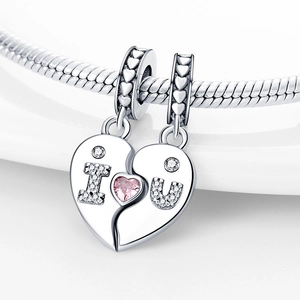 Silver-plated heart split charms with pink gemstone on a snake chain bracelet