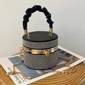 Sparkling crystal rhinestone cylinder evening bag with gold chain strap and gathered handle