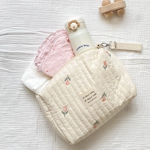 Beige quilted cotton mommy bag with tulip embroidery for strollers and diaper storage
