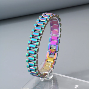 Detail of rainbow finish stainless steel link bracelet with folding clasp and engraving