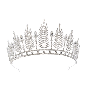 Vintage bridal crown featuring intricate crystal leaf designs on a silver metal base