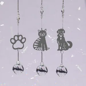 Garden suncatcher set featuring paw prints, cat and dog silhouettes with crystal prisms