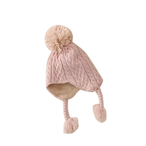 Pink winter knit baby hat with ear flaps, fleece lining and decorative pompoms