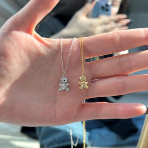 Elegant S925 sterling silver necklaces featuring sparkling bear pendants for women